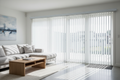 PVC Vertical Blinds in Smooth White hanging over a sliding patio door
