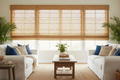 Bamboo roman woven wood shades in a bright coastal California-style living room