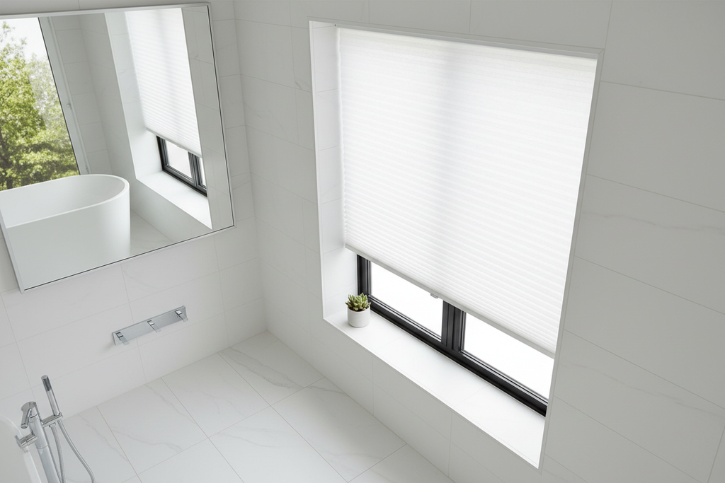 Top-down bottom-up cordless cellular shades open at top for light while closed at bottom for privacy