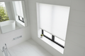 Top-down bottom-up cordless cellular shades open at top for light while closed at bottom for privacy
